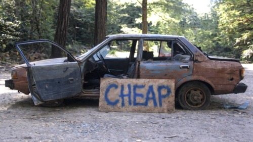 cheap registered agent service warning sign spray painted